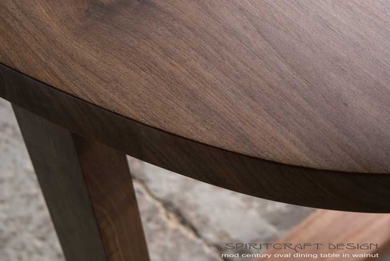 Interior Design Accents - Solid Black Walnut dining room table in a timeless mid century style for East Coast client by Spiritcraft Design Furniture of East Dundee, Illinois