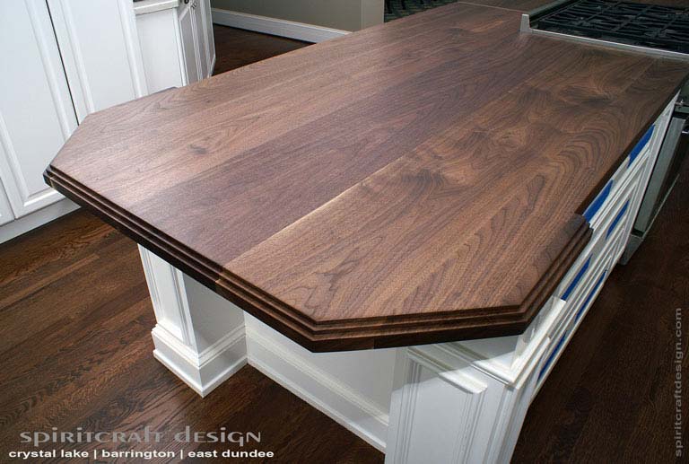 Interior Design Accents - Stunning solid Black Walnut hardwood slab kitchen island top in Glenview, Illinois by Spiritcraft Design of East Dundee, IL