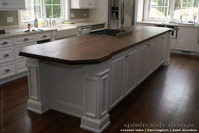 Interior Design Accents - Solid hardwood Walnut slab kitchen island top in Glenview, Illinois by Spiritcraft Design Furniture of East Dundee, IL